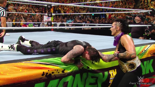 WWE_Money_In_The_Bank_2023_Rhea_Ringside_Attacks_Cody_1899.jpg