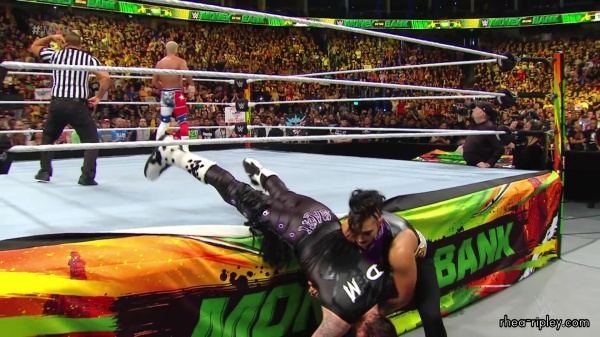 WWE_Money_In_The_Bank_2023_Rhea_Ringside_Attacks_Cody_1903.jpg