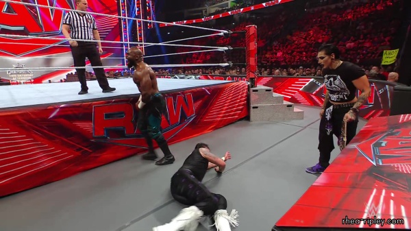 WWE_Raw_05_22_23_Rhea_Ringside_Attacks_Apollo_527.jpg