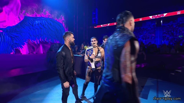 WWE_Raw_05_29_23_Rhea_Ringside_Seth_Puts_Arm_On_Rhea_037.jpg