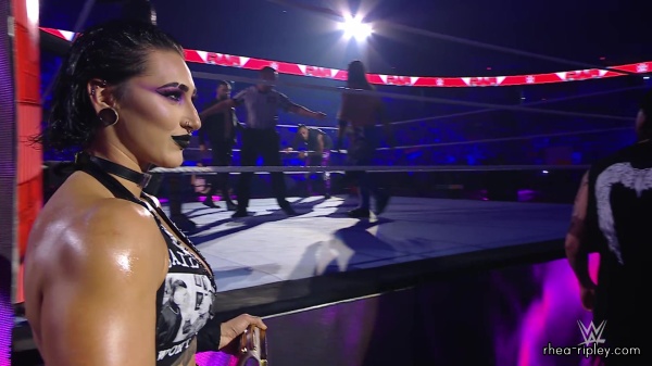 WWE_Raw_05_29_23_Rhea_Ringside_Seth_Puts_Arm_On_Rhea_087.jpg