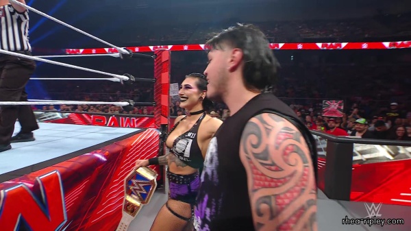 WWE_Raw_05_29_23_Rhea_Ringside_Seth_Puts_Arm_On_Rhea_229.jpg