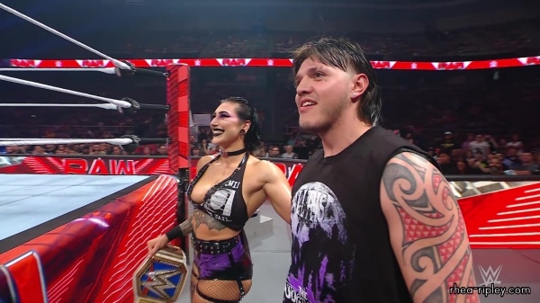 WWE_Raw_05_29_23_Rhea_Ringside_Seth_Puts_Arm_On_Rhea_230.jpg