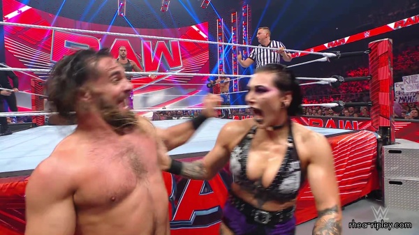 WWE_Raw_05_29_23_Rhea_Ringside_Seth_Puts_Arm_On_Rhea_269.jpg