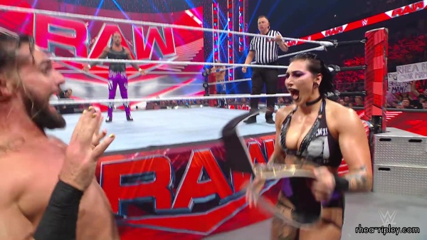 WWE_Raw_05_29_23_Rhea_Ringside_Seth_Puts_Arm_On_Rhea_270.jpg