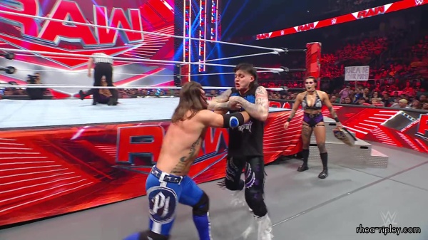 WWE_Raw_05_29_23_Rhea_Ringside_Seth_Puts_Arm_On_Rhea_340.jpg
