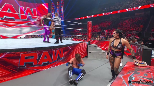 WWE_Raw_05_29_23_Rhea_Ringside_Seth_Puts_Arm_On_Rhea_401.jpg