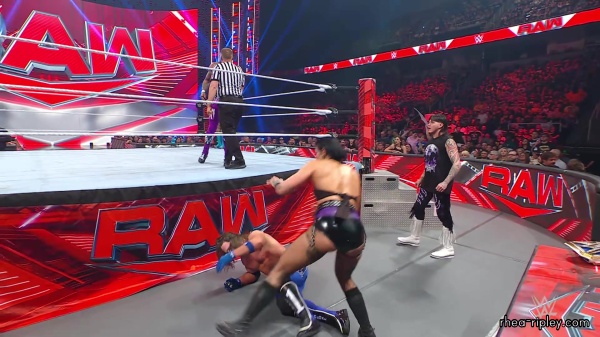 WWE_Raw_05_29_23_Rhea_Ringside_Seth_Puts_Arm_On_Rhea_406.jpg
