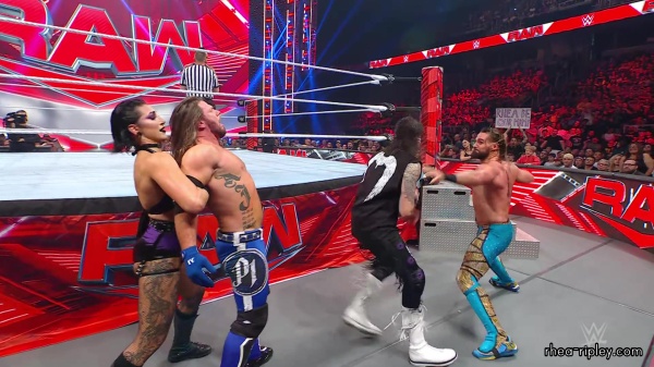 WWE_Raw_05_29_23_Rhea_Ringside_Seth_Puts_Arm_On_Rhea_422.jpg