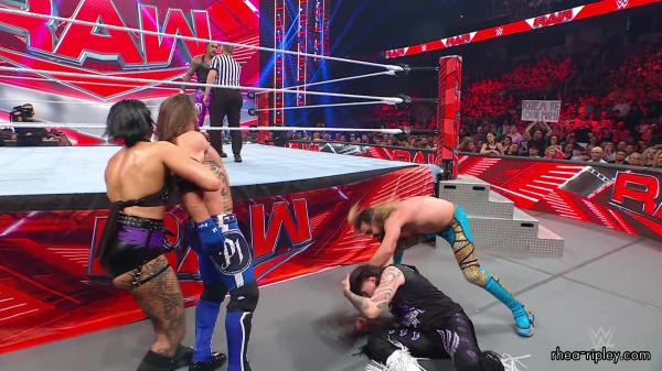 WWE_Raw_05_29_23_Rhea_Ringside_Seth_Puts_Arm_On_Rhea_427.jpg