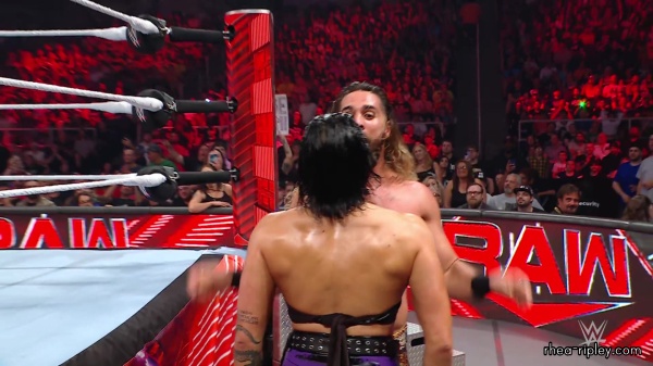 WWE_Raw_05_29_23_Rhea_Ringside_Seth_Puts_Arm_On_Rhea_448.jpg