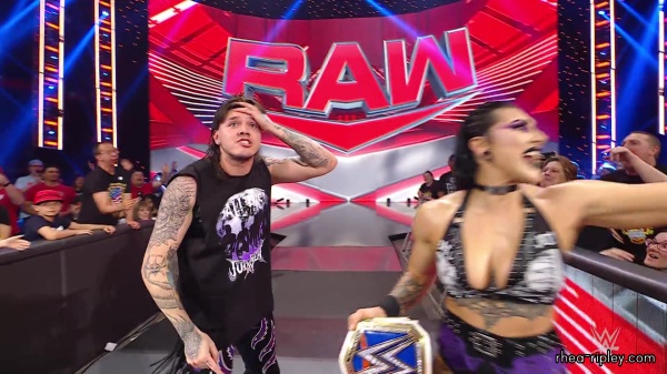 WWE_Raw_05_29_23_Rhea_Ringside_Seth_Puts_Arm_On_Rhea_507.jpg