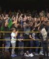 Rhea_Ripley_celebrates_with_the_NXT_Universe_032.jpg
