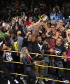 Rhea_Ripley_celebrates_with_the_NXT_Universe_106.jpg