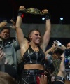 Rhea_Ripley_celebrates_with_the_NXT_Universe_250.jpg