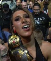 Rhea_Ripley_celebrates_with_the_NXT_Universe_350.jpg