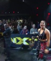 Rhea_Ripley_celebrates_with_the_NXT_Universe_444.jpg