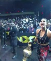 Rhea_Ripley_celebrates_with_the_NXT_Universe_445.jpg