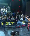 Rhea_Ripley_celebrates_with_the_NXT_Universe_455.jpg