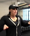 Rhea_Ripley_flexes_on_Sheamus_with_her__Nightmare__Arms_workout_0006.jpg