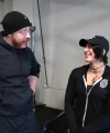Rhea_Ripley_flexes_on_Sheamus_with_her__Nightmare__Arms_workout_0151.jpg