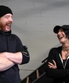 Rhea_Ripley_flexes_on_Sheamus_with_her__Nightmare__Arms_workout_0350.jpg