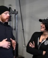 Rhea_Ripley_flexes_on_Sheamus_with_her__Nightmare__Arms_workout_0364.jpg