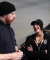 Rhea_Ripley_flexes_on_Sheamus_with_her__Nightmare__Arms_workout_0402.jpg