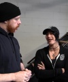 Rhea_Ripley_flexes_on_Sheamus_with_her__Nightmare__Arms_workout_0403.jpg