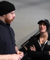 Rhea_Ripley_flexes_on_Sheamus_with_her__Nightmare__Arms_workout_0410.jpg