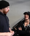 Rhea_Ripley_flexes_on_Sheamus_with_her__Nightmare__Arms_workout_0411.jpg
