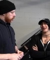 Rhea_Ripley_flexes_on_Sheamus_with_her__Nightmare__Arms_workout_0412.jpg