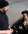 Rhea_Ripley_flexes_on_Sheamus_with_her__Nightmare__Arms_workout_0413.jpg