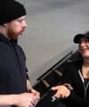 Rhea_Ripley_flexes_on_Sheamus_with_her__Nightmare__Arms_workout_0415.jpg