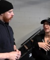Rhea_Ripley_flexes_on_Sheamus_with_her__Nightmare__Arms_workout_0421.jpg