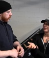 Rhea_Ripley_flexes_on_Sheamus_with_her__Nightmare__Arms_workout_0425.jpg