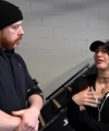 Rhea_Ripley_flexes_on_Sheamus_with_her__Nightmare__Arms_workout_0426.jpg