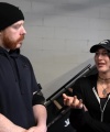Rhea_Ripley_flexes_on_Sheamus_with_her__Nightmare__Arms_workout_0429.jpg