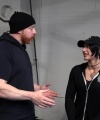 Rhea_Ripley_flexes_on_Sheamus_with_her__Nightmare__Arms_workout_0521.jpg