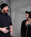 Rhea_Ripley_flexes_on_Sheamus_with_her__Nightmare__Arms_workout_0525.jpg
