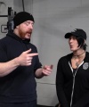 Rhea_Ripley_flexes_on_Sheamus_with_her__Nightmare__Arms_workout_0539.jpg