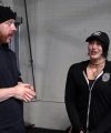 Rhea_Ripley_flexes_on_Sheamus_with_her__Nightmare__Arms_workout_0562.jpg