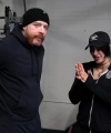 Rhea_Ripley_flexes_on_Sheamus_with_her__Nightmare__Arms_workout_0573.jpg