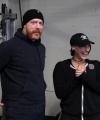 Rhea_Ripley_flexes_on_Sheamus_with_her__Nightmare__Arms_workout_0617.jpg