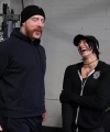 Rhea_Ripley_flexes_on_Sheamus_with_her__Nightmare__Arms_workout_0623.jpg