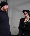 Rhea_Ripley_flexes_on_Sheamus_with_her__Nightmare__Arms_workout_0627.jpg