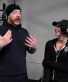 Rhea_Ripley_flexes_on_Sheamus_with_her__Nightmare__Arms_workout_0652.jpg