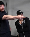 Rhea_Ripley_flexes_on_Sheamus_with_her__Nightmare__Arms_workout_0666.jpg