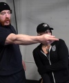 Rhea_Ripley_flexes_on_Sheamus_with_her__Nightmare__Arms_workout_0667.jpg