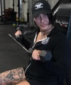 Rhea_Ripley_flexes_on_Sheamus_with_her__Nightmare__Arms_workout_0787.jpg
